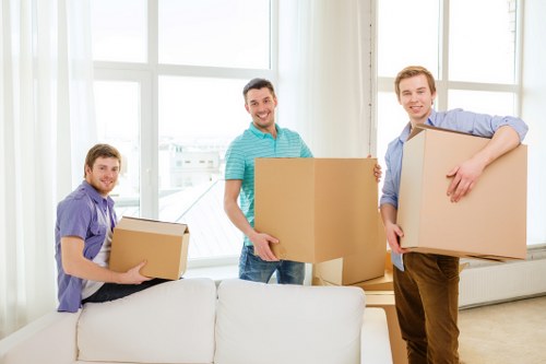 Professional movers packing boxes in Surrey